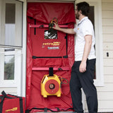 Technician running a Retrotec 300 blower door test