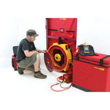 Vent Cap SystemsRetrotec, Ltd.Retrotec Blower Door | 6100 Series | Hi-PowerImage depicts a technician kneeling next to a fully set-up Retrotec 6100 Series Blower Door System. He is in the process of adjusting a flow ring equipped with eight 4-inch holes. The photo provides a detailed view of the fan controllers and storage cases, emphasizing the system's ease-of-use and versatility.